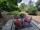 Enjoy the outdoors in this backyard with patio seating and a well-kept lawn at 8543 Redstone St, Highlands Ranch, CO 80126