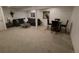 Cozy basement area with comfortable seating and dining, great for relaxing and entertaining guests at 8543 Redstone St, Highlands Ranch, CO 80126