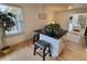 Bright living room features hardwood floors, and an open floor plan with great natural light at 8543 Redstone St, Highlands Ranch, CO 80126