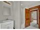 Bathroom with modern sink vanity, subway tile, and updated fixtures at 2411 N High St, Denver, CO 80205