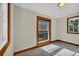 Bedroom with carpet, natural light, neutral walls and wooden trim at 2411 N High St, Denver, CO 80205