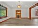Bright living room with hardwood floors and a decorative fireplace at 2411 N High St, Denver, CO 80205