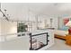 Bright living space features tall ceilings, track lights and lofted upper area at 930 Acoma St # 108, Denver, CO 80204