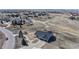 Spacious home with a three-car garage, large driveway, and landscaping in a serene neighborhood near open spaces at 14701 Yosemite St, Brighton, CO 80602