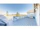 The back deck offers a tranquil view of the lawn and surrounding landscape, great for unwinding at 14701 Yosemite St, Brighton, CO 80602