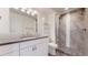 Updated bathroom with modern vanity, tiled shower, and contemporary fixtures at 14701 Yosemite St, Brighton, CO 80602
