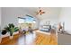 Stylish main bedroom with hardwood floor, ceiling fan and large windows at 14701 Yosemite St, Brighton, CO 80602