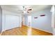 Bedroom with wood floors, ceiling fan, large closet and attached bath at 14701 Yosemite St, Brighton, CO 80602
