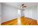Bedroom with hardwood floors, ceiling fan, and closet at 14701 Yosemite St, Brighton, CO 80602