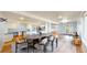 Open concept dining area offering kitchen access and walk out access to the back at 14701 Yosemite St, Brighton, CO 80602