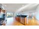 Modern kitchen with granite countertops, stainless steel appliances, hardwood floors and scenic outdoor views at 14701 Yosemite St, Brighton, CO 80602