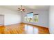 Spacious living room with hardwood floors, recessed lighting, and bright windows at 14701 Yosemite St, Brighton, CO 80602