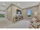 Bedroom featuring a wall mounted TV, carpeted flooring, and a natural light window at 5428 Forest View Rd, Parker, CO 80134