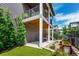 Backyard with a patio, upper deck, and well-maintained landscaping at 8958 Southurst St, Littleton, CO 80129