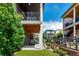 Backyard featuring patio, upper deck, and artificial turf lawn at 8958 Southurst St, Littleton, CO 80129
