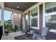 Cozy outdoor seating area with a gray rug and chairs to sit and relax at 8958 Southurst St, Littleton, CO 80129