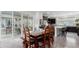 Dining area adjacent to a modern kitchen with sliding doors to the patio at 8958 Southurst St, Littleton, CO 80129