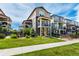Inviting two-story home with a well-manicured lawn and sidewalks at 8958 Southurst St, Littleton, CO 80129