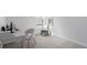 Bright home office with a stylish desk, chair, and plenty of natural light at 8958 Southurst St, Littleton, CO 80129