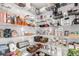 Organized walk-in pantry with ample shelving for food storage and kitchen appliances at 8958 Southurst St, Littleton, CO 80129