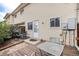 Small backyard with patio and access to the unit at 1282 S Troy St, Aurora, CO 80012