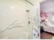 Bathroom with shower/tub combo and floral shower curtain at 1282 S Troy St, Aurora, CO 80012