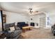 Bright and spacious living room with a fireplace and ample natural light at 1282 S Troy St, Aurora, CO 80012