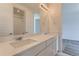Bathroom with double vanity and a view into the shower and toilet area at 2525 Lupton Ln, Lafayette, CO 80026