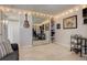 Cozy bedroom with mirrored closet, carpet, and fun string lights at 3131 E Alameda Ave # 1003, Denver, CO 80209