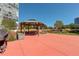 Outdoor gazebo with seating for gatherings and cooking, along with lovely landscaping at 3131 E Alameda Ave # 1003, Denver, CO 80209