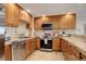 Updated kitchen features stainless steel appliances, tile backsplash and ample counter space at 3131 E Alameda Ave # 1003, Denver, CO 80209