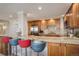 Spacious kitchen featuring a breakfast bar with plenty of seating at 3131 E Alameda Ave # 1003, Denver, CO 80209