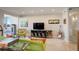 Comfortable living room with stylish decor and access to a sunroom at 3131 E Alameda Ave # 1003, Denver, CO 80209
