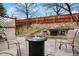 Backyard oasis with a fire pit and outdoor kitchen at 21733 Saddlebrook Dr, Parker, CO 80138