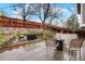 Outdoor living space with fire pit, grill and upper terraced garden at 21733 Saddlebrook Dr, Parker, CO 80138