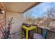Inviting balcony featuring a bistro table, chair, and bike offers a private outdoor escape at 1243 Gaylord St # 410, Denver, CO 80206