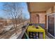 Balcony view showcasing residential street, foliage, and a lovely area for enjoying the outdoors at 1243 Gaylord St # 410, Denver, CO 80206