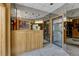 Welcoming lobby featuring mirrored walls, a wooden desk, and easy access to entry doors at 1243 Gaylord St # 410, Denver, CO 80206