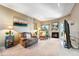 Cozy living room with fireplace, comfortable seating, and soft lighting perfect for relaxation and Gathering time at 2428 W 82Nd Pl # 1D, Westminster, CO 80031