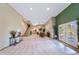 Open basement floor plan with stairs and patio access at 8174 Inca Rd, Larkspur, CO 80118