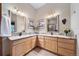 Large bathroom with double vanity and granite countertop at 8174 Inca Rd, Larkspur, CO 80118