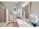 Clean bathroom with a large mirror and updated vanity at 8174 Inca Rd, Larkspur, CO 80118