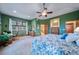 Large bedroom with en-suite bathroom and home office area at 8174 Inca Rd, Larkspur, CO 80118
