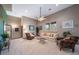 Spacious bonus room with comfy seating and mountain views at 8174 Inca Rd, Larkspur, CO 80118
