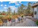 Spacious deck with outdoor seating and mountain views at 8174 Inca Rd, Larkspur, CO 80118