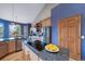 Modern kitchen with stainless steel appliances and granite countertops at 8174 Inca Rd, Larkspur, CO 80118