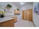 Laundry room with built-in cabinets and countertop at 8174 Inca Rd, Larkspur, CO 80118