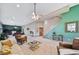 Bright living room with high ceilings and ample natural light at 8174 Inca Rd, Larkspur, CO 80118