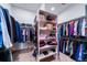 Spacious walk-in closet with ample shelving and hanging space at 8174 Inca Rd, Larkspur, CO 80118