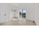 Light and airy bedroom with closet and large window offering neighborhood views at 1907 W Elk Pl, Denver, CO 80211